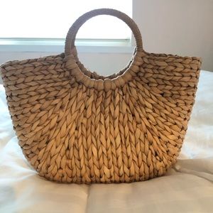 South beach half moon straw bag.